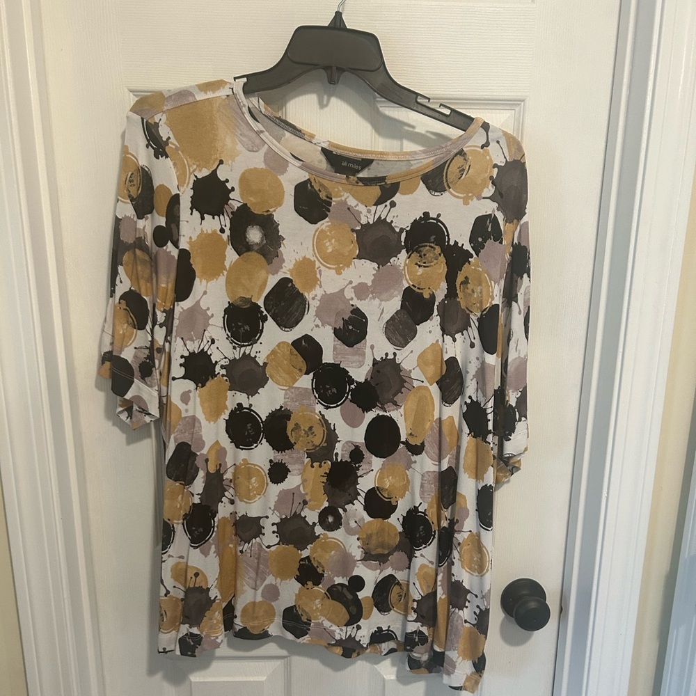 Relaxed Dot Print Women’s Top in Mustard and Black
Ali Miles